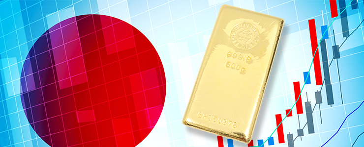 日本の国旗と金相場グラフと金の延べ棒